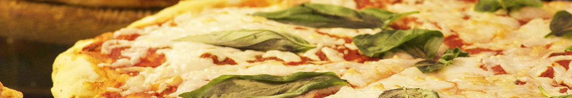 Eating Pizza at Red's Pizza restaurant in Richland, GA.